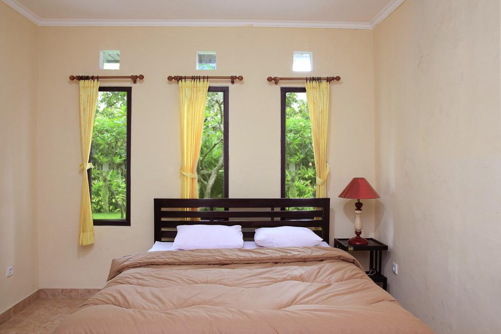 Cinthya Guest House Legian Værelse billede